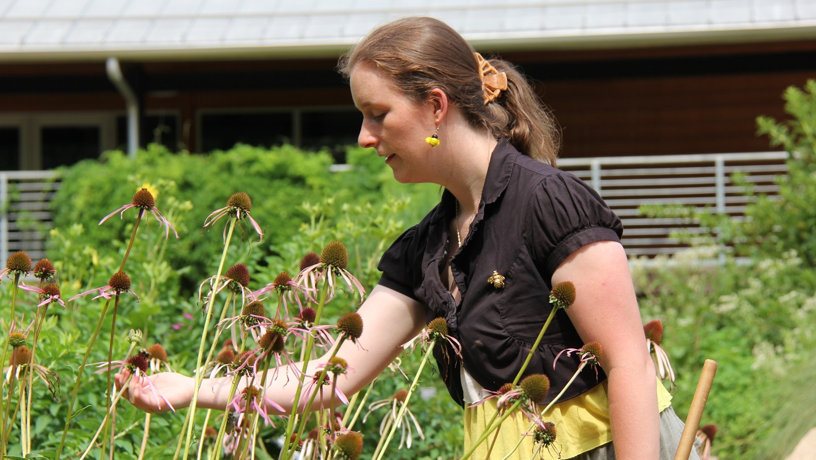 April examines flower