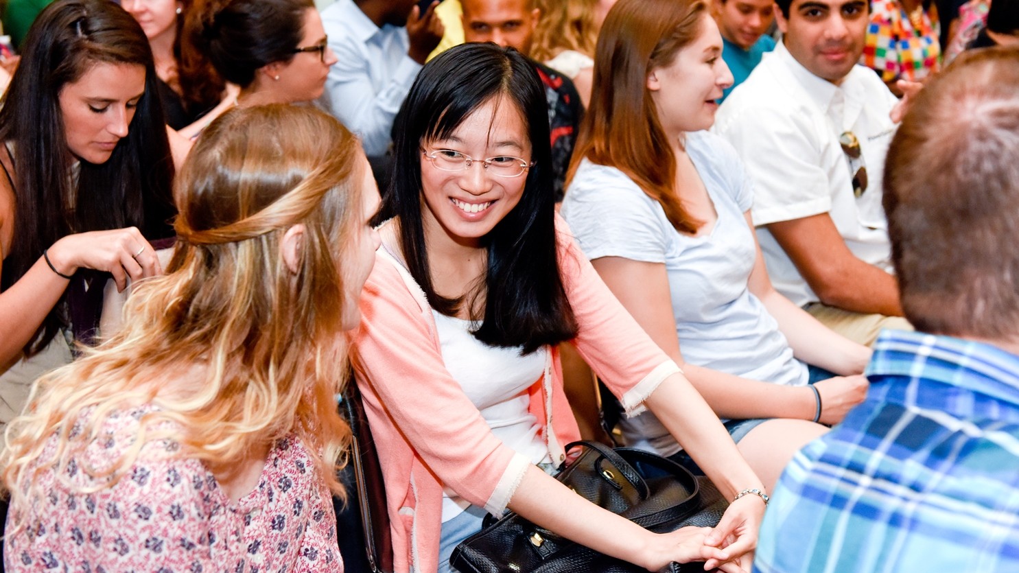 Women talking in crowd