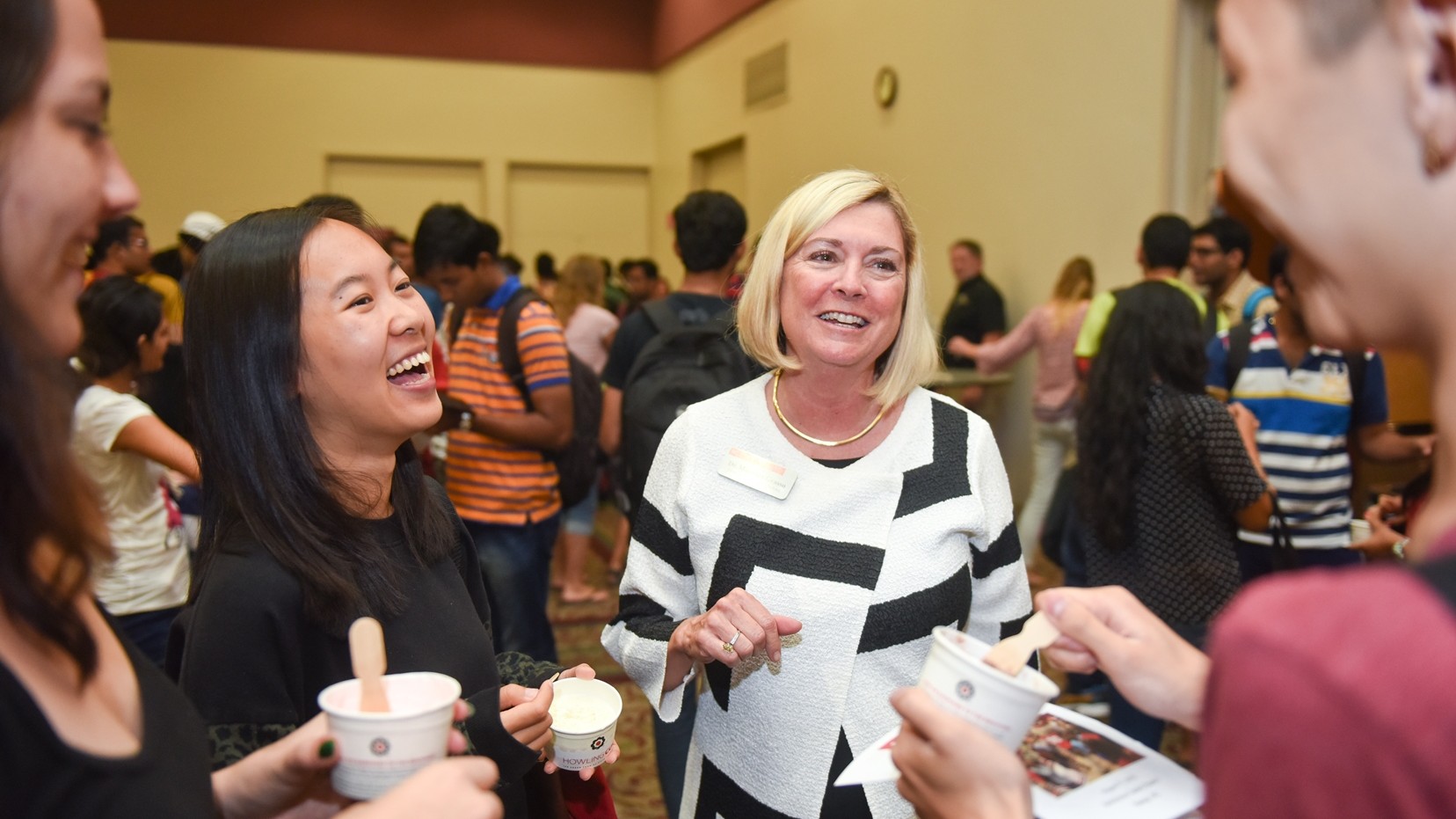 Dean Grasso talking with students