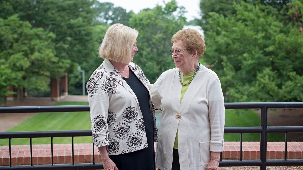 Dean Grasso and Peggy Olive standing outside