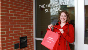 Kelsey in front of Graduate School