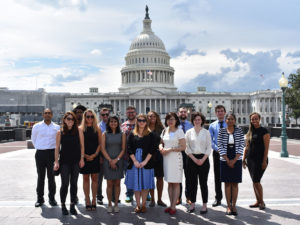 group standing in front of Capitol