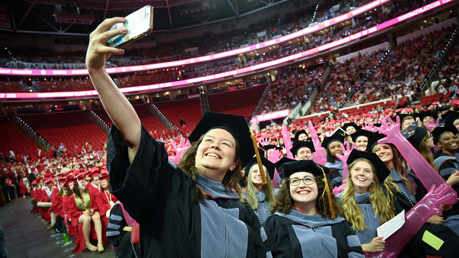 Graduate students celebrate their achievements during commencement