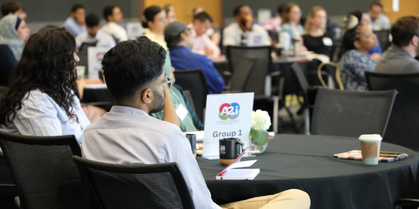 Participants listening to presentation.