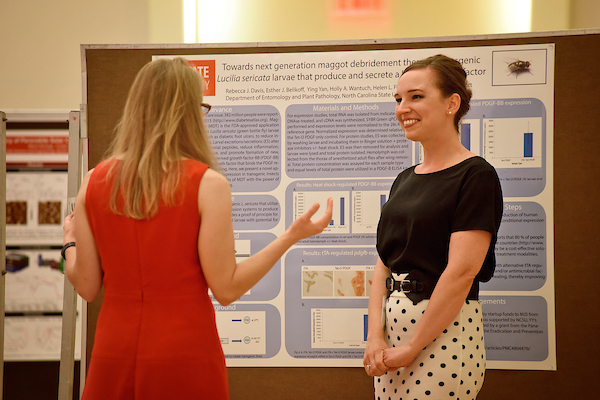 Postdoctoral fellow presenting their research during the Postdoctoral Research Symposium. 